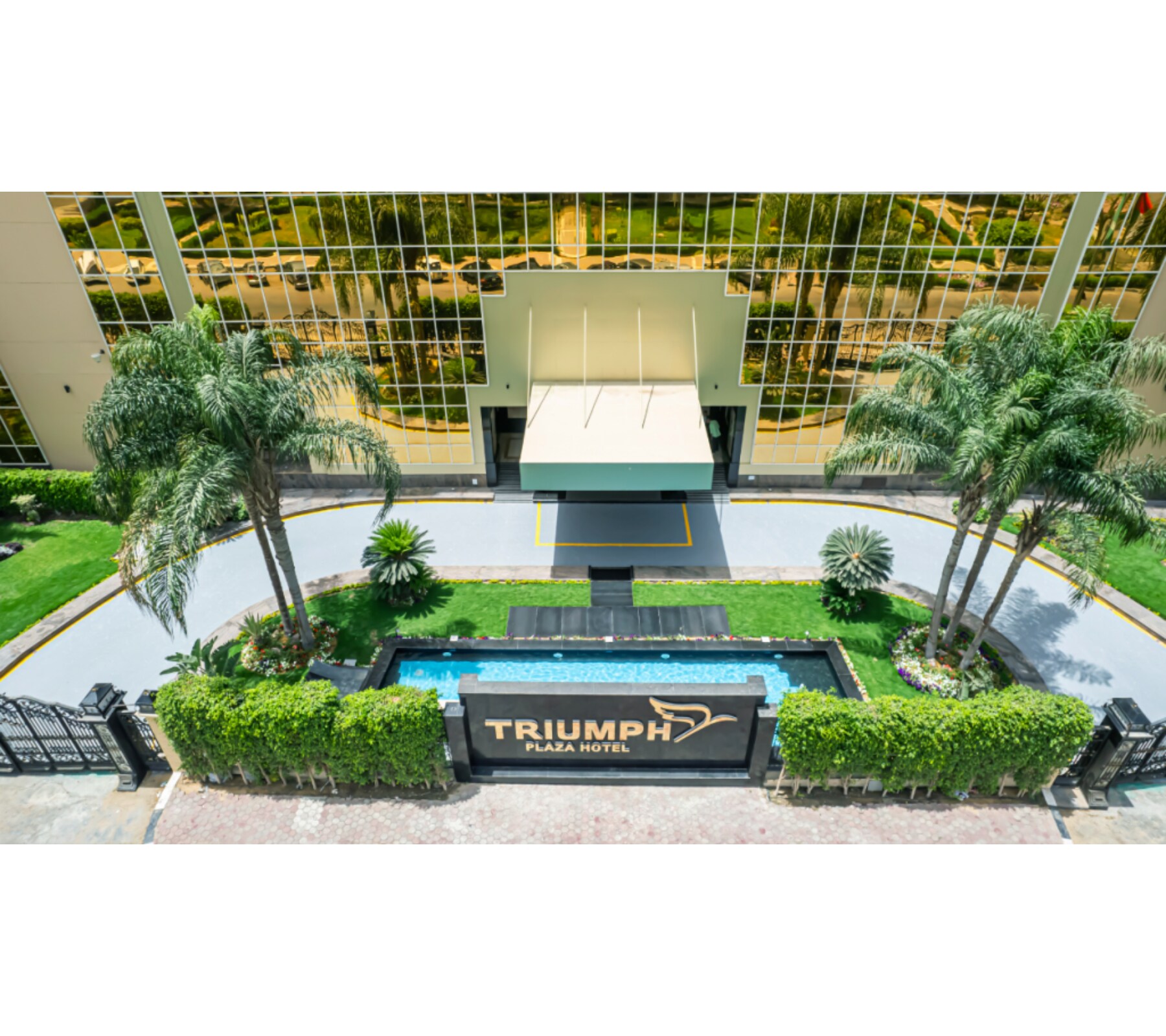 Triumph Plaza Hotel - Tap to explore photos