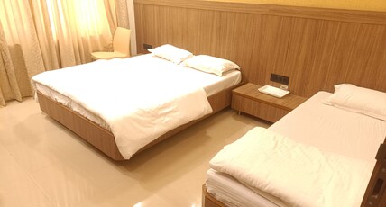 Ambika Family Restaurant Room Type - Triple Bed Ac Deluxe Room