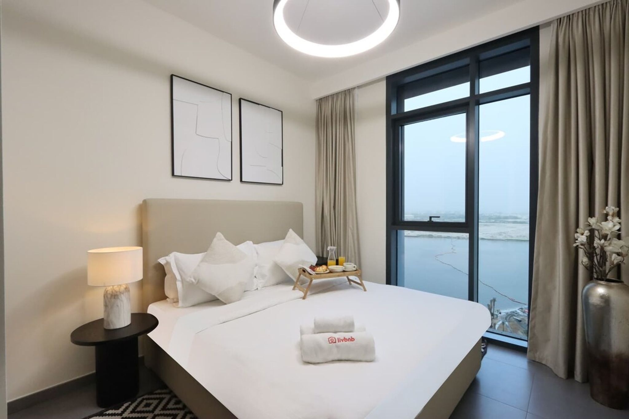 ELIVAAS Curated Waterfront 2BR with Dubai Skyline Views - Tap to explore photos