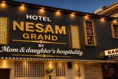 Rooms of Hotel Nesam Grand by Mom & daughters hospitality