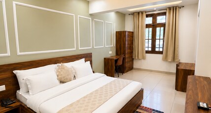 Hotel Meghna Room Type - Luxury Room - 220 sq ft comes with a AC, Smart Tv , study table, dining table, free wi-fi. Hotel Meghna Room Type - Luxury Room - 220 sq ft comes with a AC, Smart Tv , study table, dining table, free wi-fi.