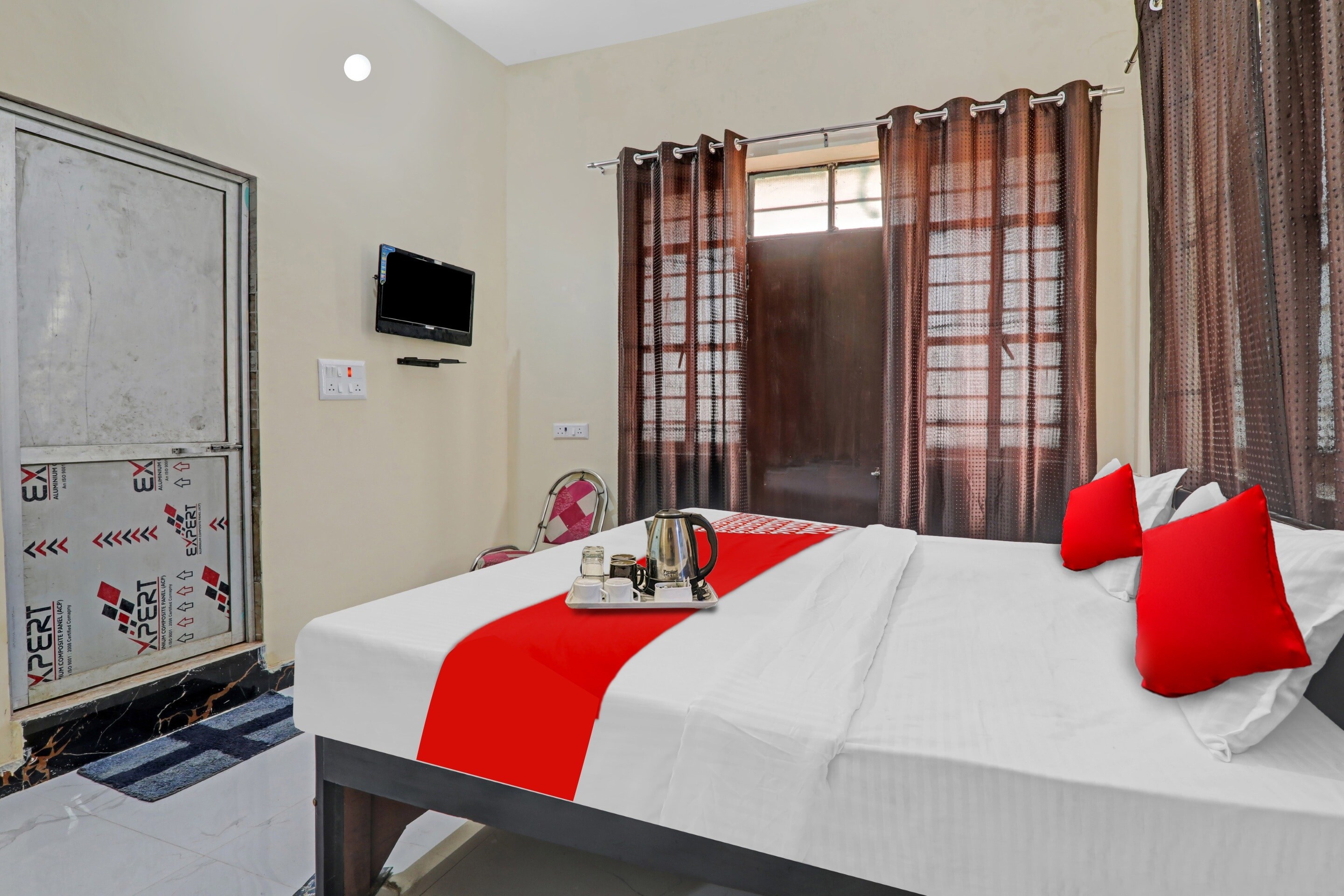 Hotel O by OYO Sunrise Inn - Tap to explore photos