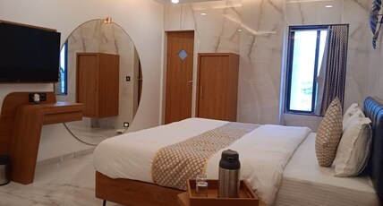 Hotel Sammati Room Type - Deluxe AC King Bed