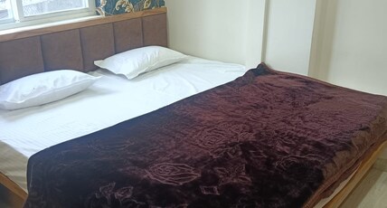 SHREE JAIN PALACE Room Type - Deluxe Room with City View SHREE JAIN PALACE Room Type - Deluxe Room with City View