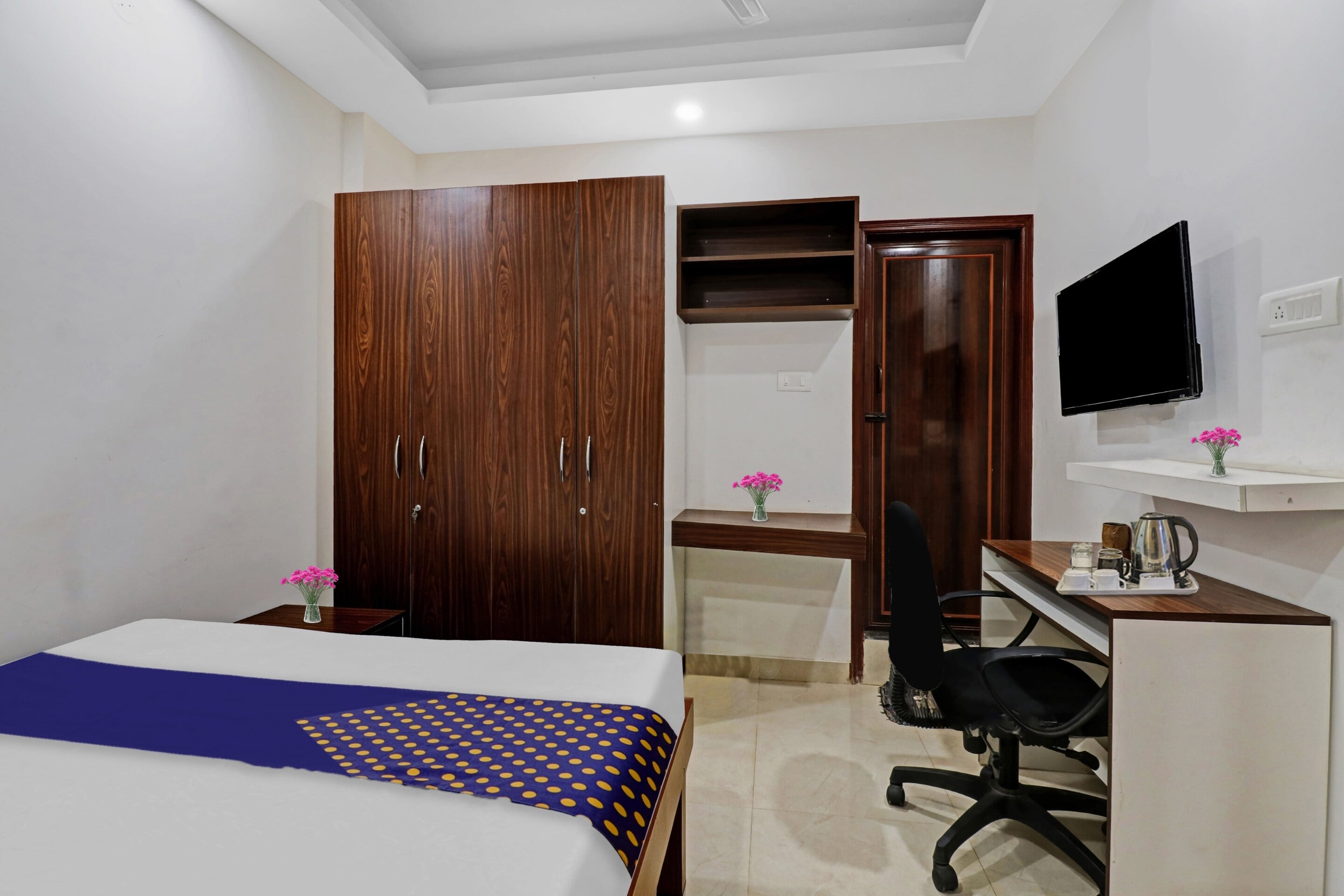 Hotel O Dhanish Comforts - Tap to explore photos