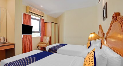 Capital O Indrapuri Rajadhani Room Type - Deluxe