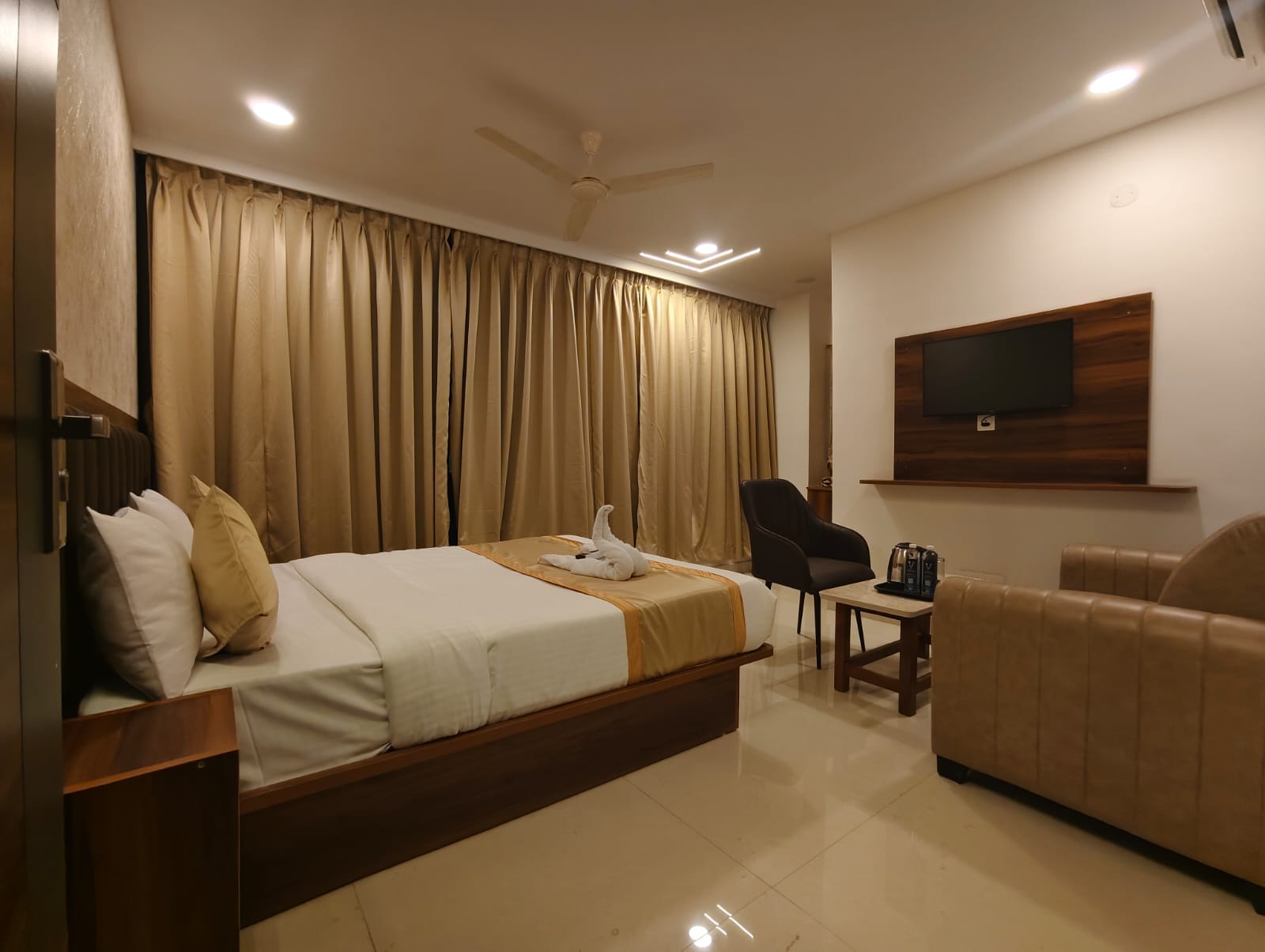 Hotel Vamshi Grand - Tap to explore photos
