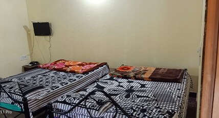Evergreen homestay Room Type - Family Room