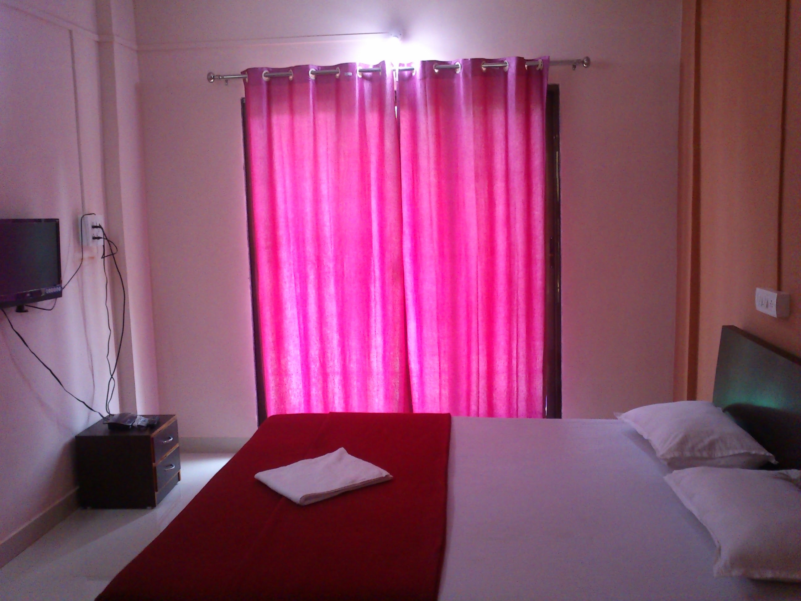 Hotel Malhar - Tap to explore photos