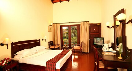 Abad Whispering Palms Room Type - Garden View Cottage with Sitout
