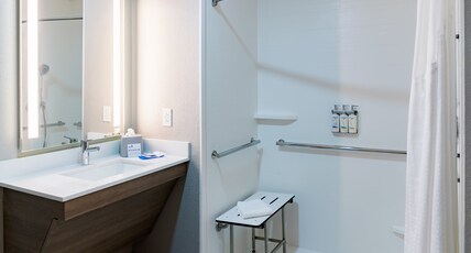 Holiday Inn Express Hotel & Suites Raleigh SW NC State Room Type - 1 King Standard Communication Accessible Roll in Shower Holiday Inn Express Hotel & Suites Raleigh SW NC State Room Type - 1 King Standard Communication Accessible Roll in Shower