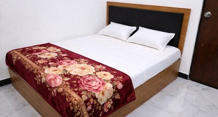 Vinamra Palace Homestay Room Type - Deluxe Room