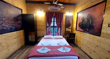 Mudravilla Room Type - AC Deluxe cottage(Pink)