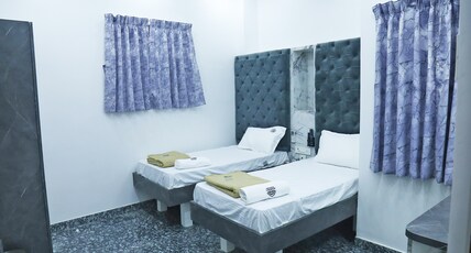 JSM Residency Room Type - Twin Cot Rooms