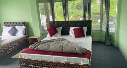 Hotel Shantiniketan Inn Room Type - Queen Bed Room with Hill View Hotel Shantiniketan Inn Room Type - Queen Bed Room with Hill View