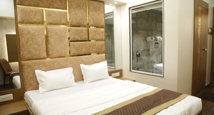 M Residency Hotel Room Type - Deluxe AC Room