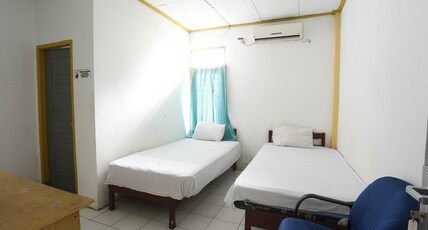 Hotel O Penginapan Budhe Sri Room Type - Indonesia Standard Twin