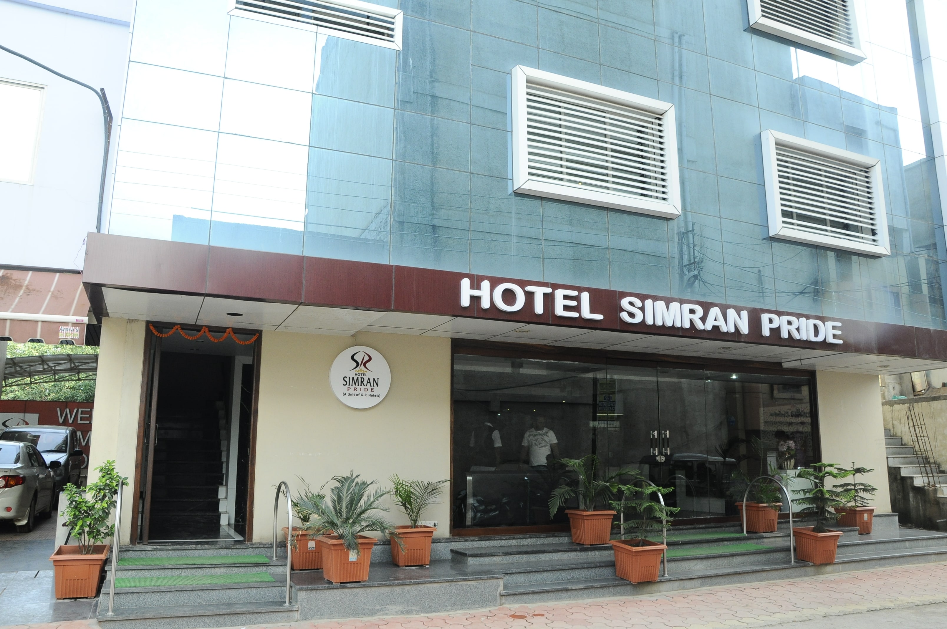 Hotel Simran Pride - Tap to explore photos