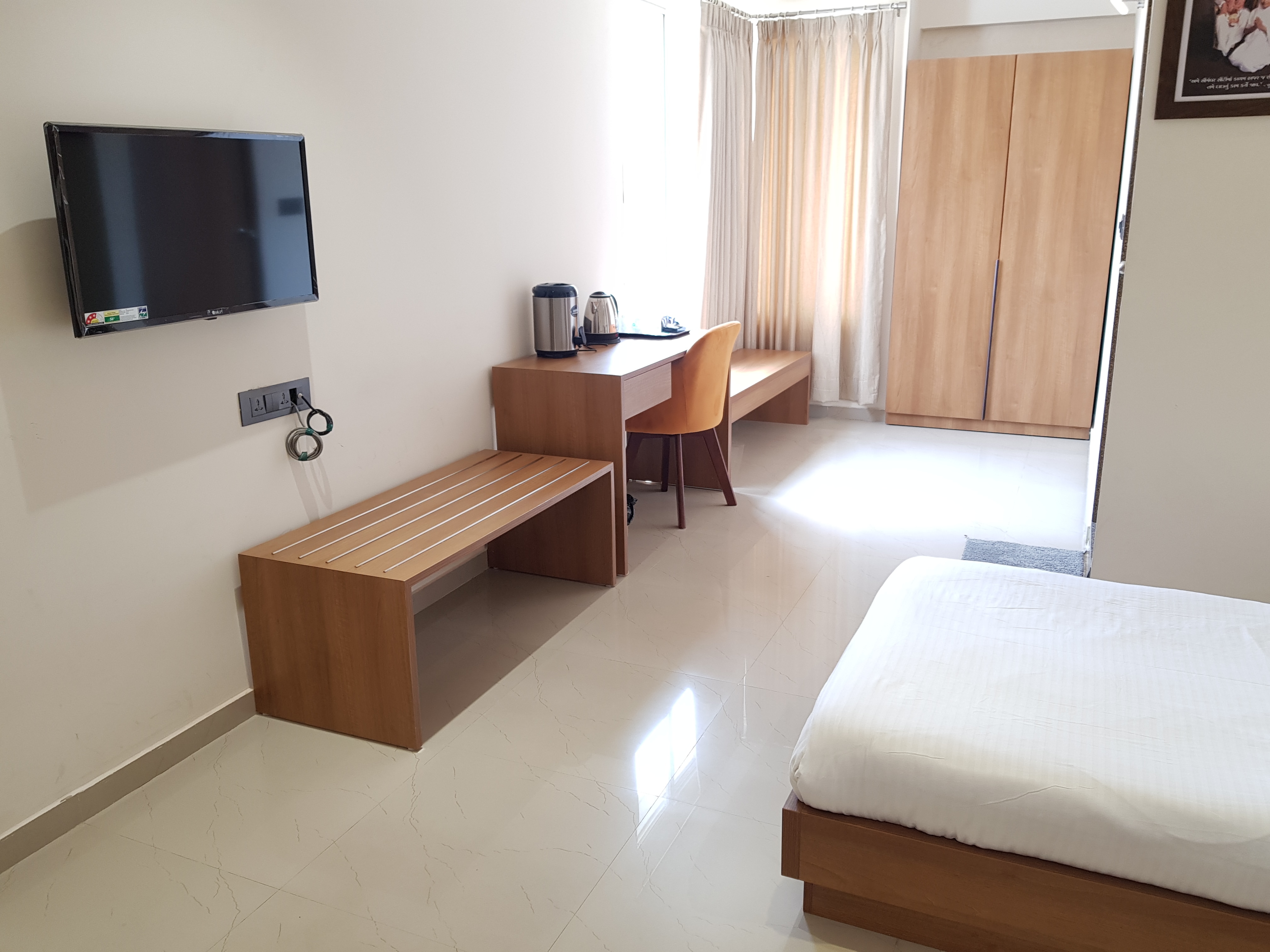 Siara Styles Amba Suites - Tap to explore photos