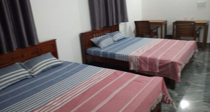 OCEAN PEARL RESIDENCY PERAVOOR Room Type - DELUXE ROOM