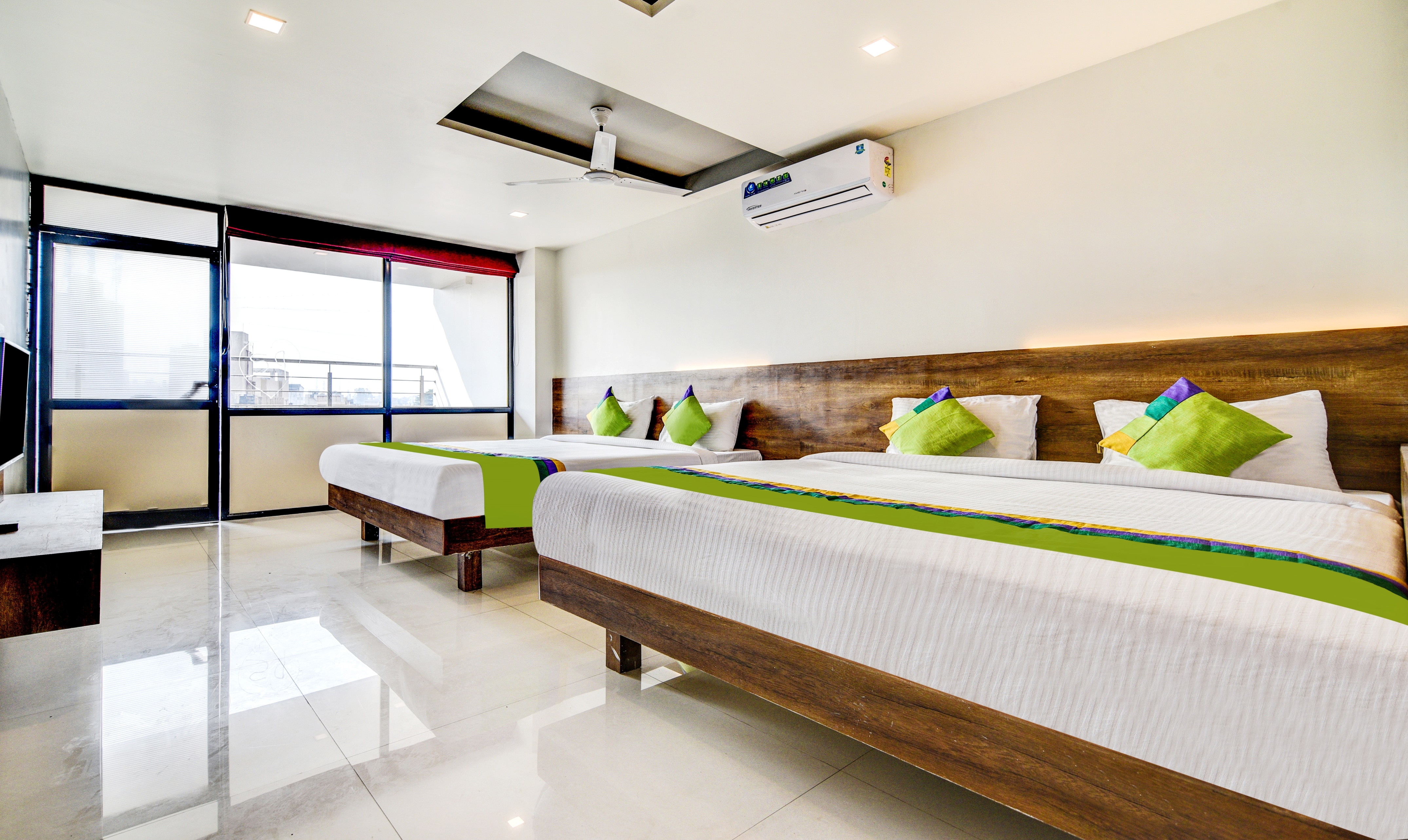Treebo Shree Sai Suites - Tap to explore photos