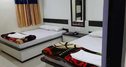 Puja International Hotel Room Type - DELUXE FOUR BED ROOM Puja International Hotel Room Type - DELUXE FOUR BED ROOM