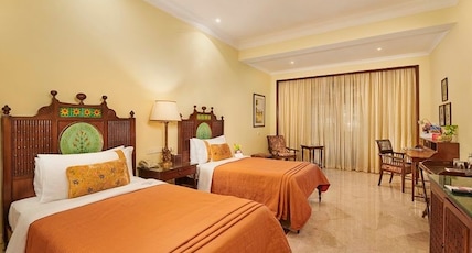The Lalit Golf & Spa Resort Room Type - Garden View Suite - Twin with Balcony Bathtub The Lalit Golf & Spa Resort Room Type - Garden View Suite - Twin with Balcony Bathtub