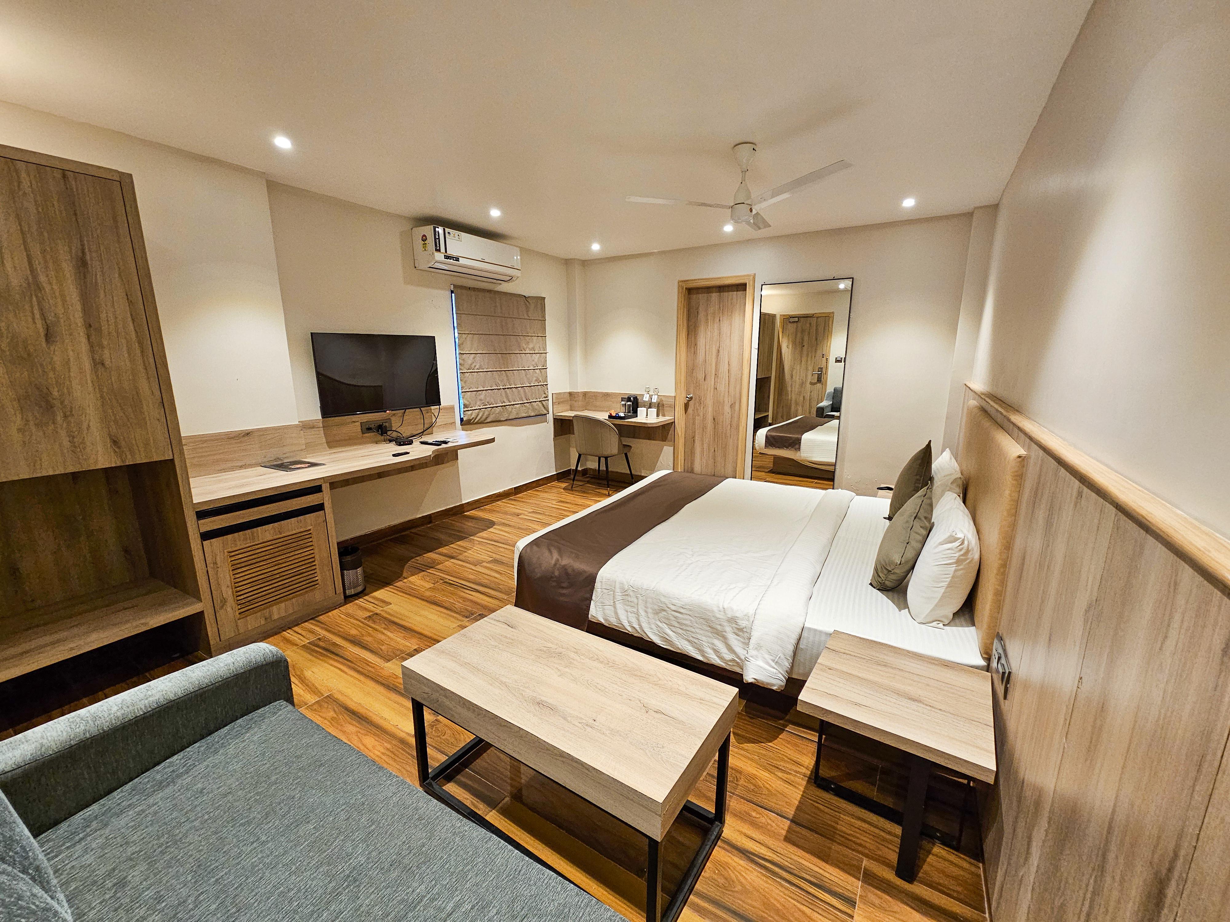 The Firangipani Suites - Tap to explore photos