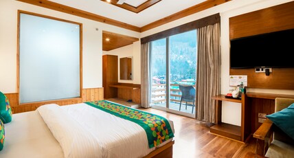 Treebo Premium Sattva With Mountain View Room Type - Deluxe Room with Balcony