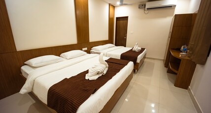 HOTEL NAKSHATRA Room Type - 2 KING BEDDED ROOM
