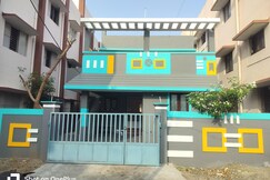 Sringam Service Apartments | Rooms & Kitchen