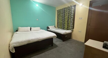 Narayan Palace by Nature Nests Room Type - Deluxe Triple Room