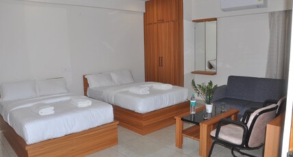 Vasudev Comforts Room Type - Premium Deluxe AC Room
