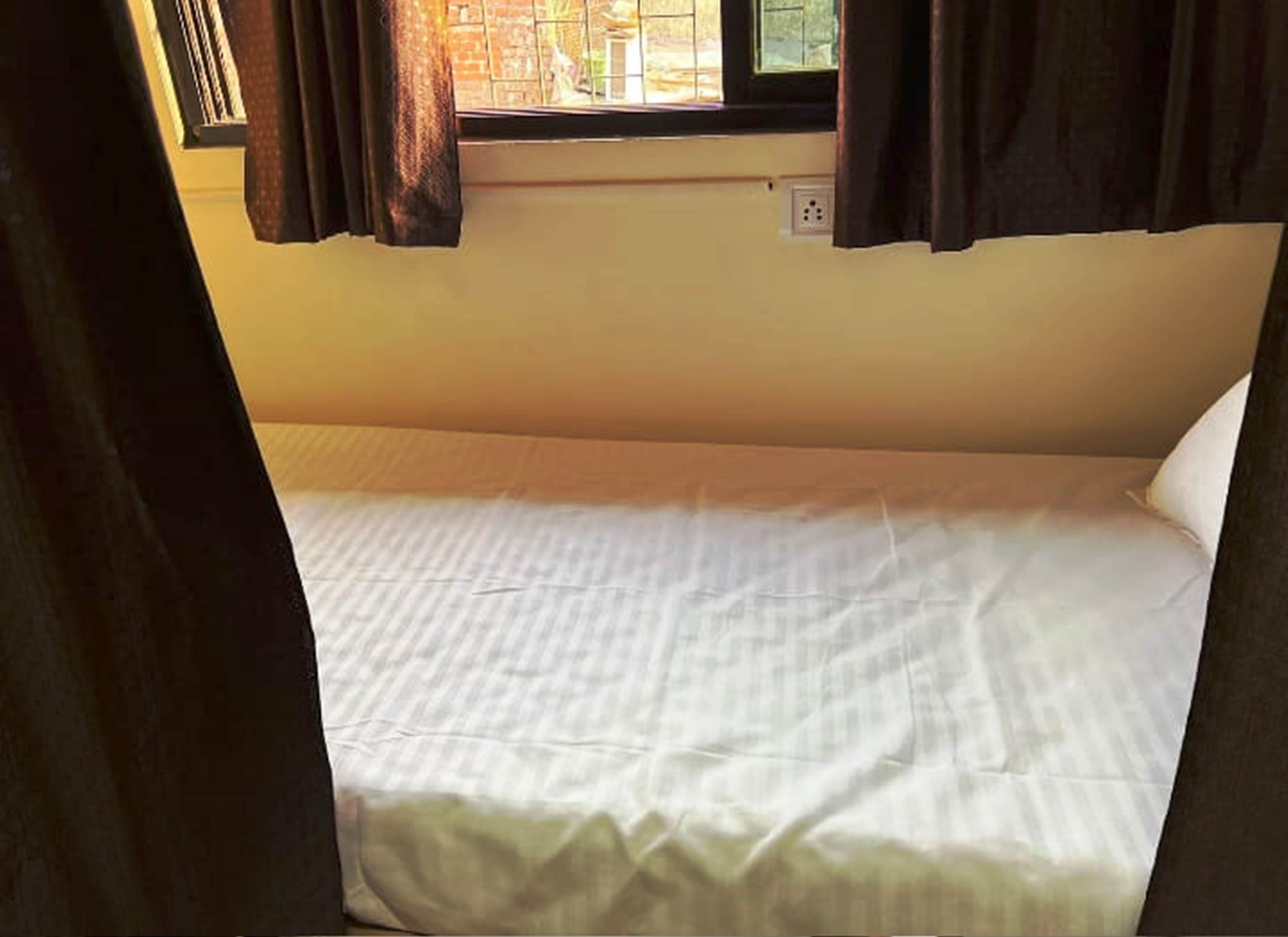 New Rest Inn AC Dormitory - Tap to explore photos