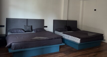 Crown Plaza Hotel and Cafe Room Type - Family Room with Mountain View Bed