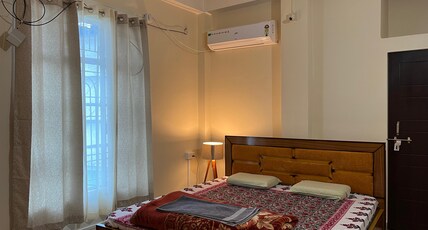 Ujoni Homestay Duliajan Room Type - ONE BHK Unit E with AC and attach washroom and living room