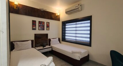 GREENLAND COTTAGES Room Type - Twin Bed Room
