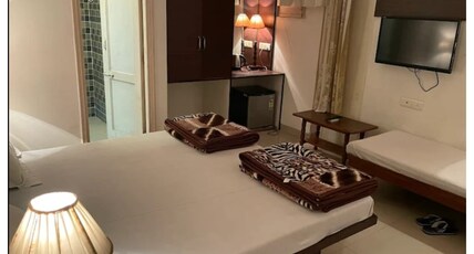 Samrat Hotel Room Type - Deluxe Room.