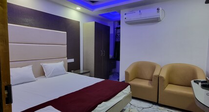 HOTEL AKASH GANGA Room Type - DOUBLE BED AC DELUXE