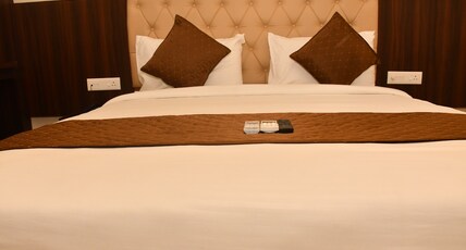 Hotel MG Grand Room Type - Deluxe Double Room