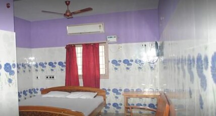 Hotel Eswara Temple Stay Room Type - Deluxe Triple Room AC