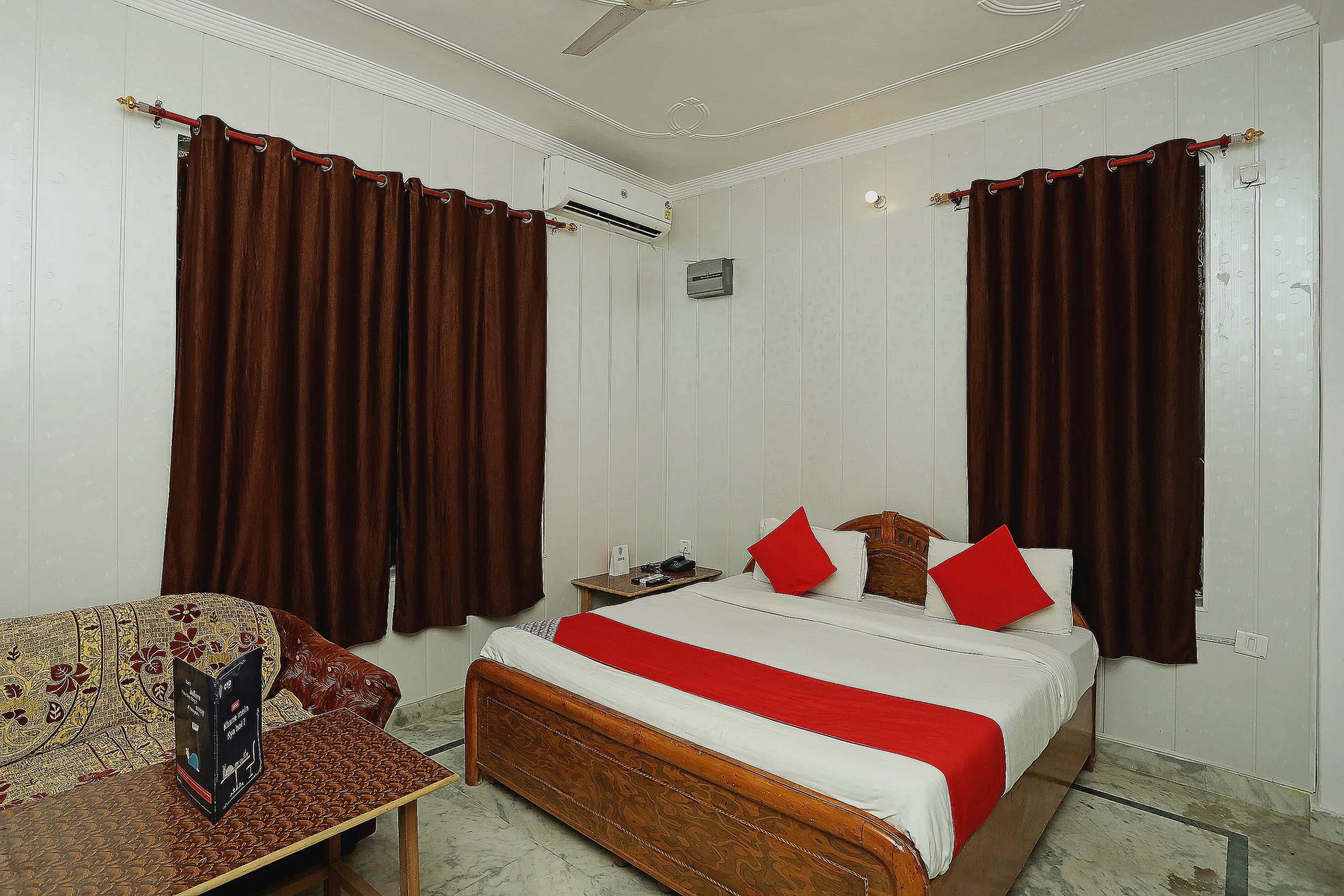 Hotel O Laxmi Yellow Guest House - Tap to explore photos