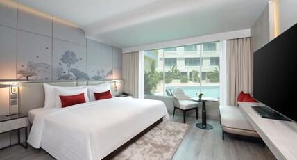 Centre Point Sukhumvit 10 Room Type - Deluxe Pool View (New Wing) - child breakfast extra cost at THB 265 per night pay at hotel