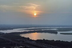 Zen Zora | Supernova Studio | River and City View