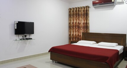 GVK Inn Room Type - Executive Room - King Bed (AC)