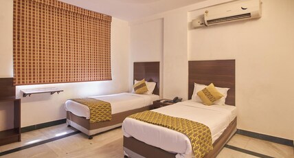 New Metro Residency Room Type - Deluxe King Room