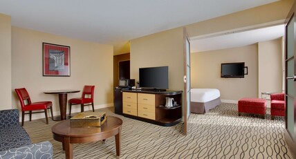 Hilton Rosemont Chicago O'Hare Room Type - 1 KING BED 1 BEDROOM SUITE Hilton Rosemont Chicago O'Hare Room Type - 1 KING BED 1 BEDROOM SUITE
