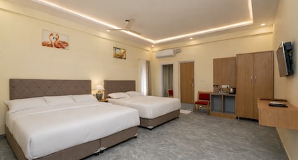 The Casiita Resort Room Type - Family AC Room with 1 king and 1 queen beds for 5 persons The Casiita Resort Room Type - Family AC Room with 1 king and 1 queen beds for 5 persons