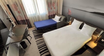 Novotel Limoges Le Lac Room Type - Classic Room with 1 double bed and 1 single sofa bed
