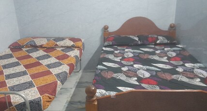 Mahadev Residency Room Type - Deluxe family room 108